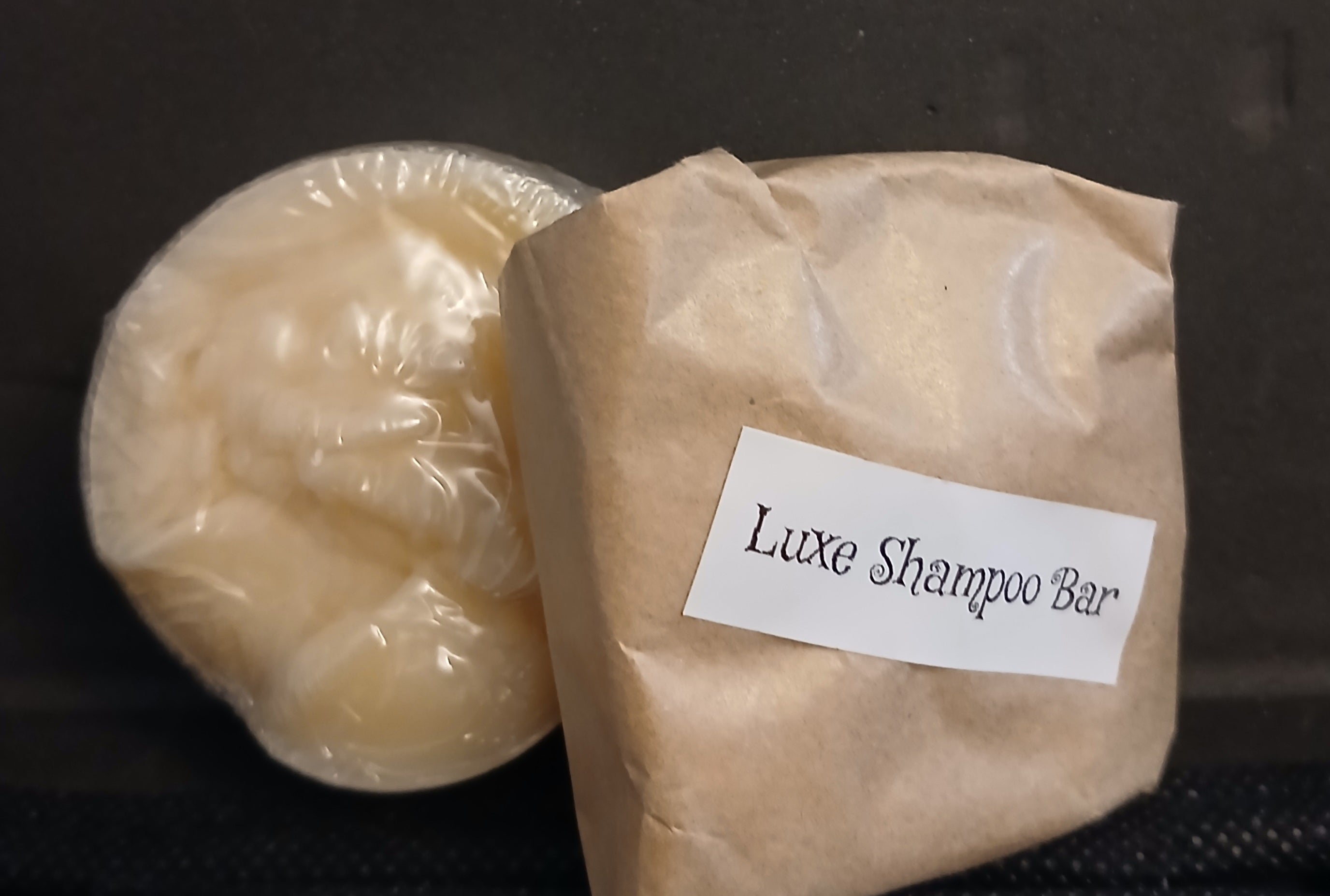 Luxe Shampoo Bar – round and square bars wrapped in kraft paper packaging